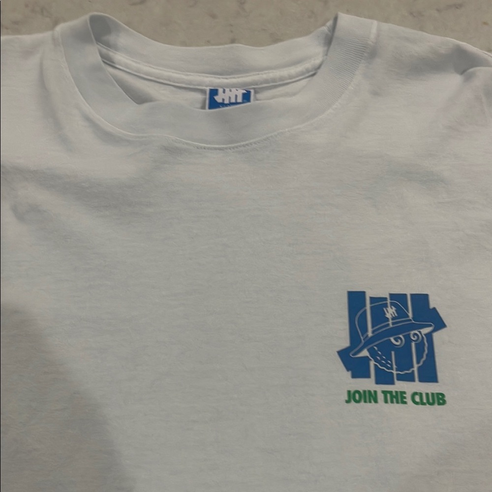 Malbon Undefeated L/S tee great cond Shirt was white but now light blue tint XL